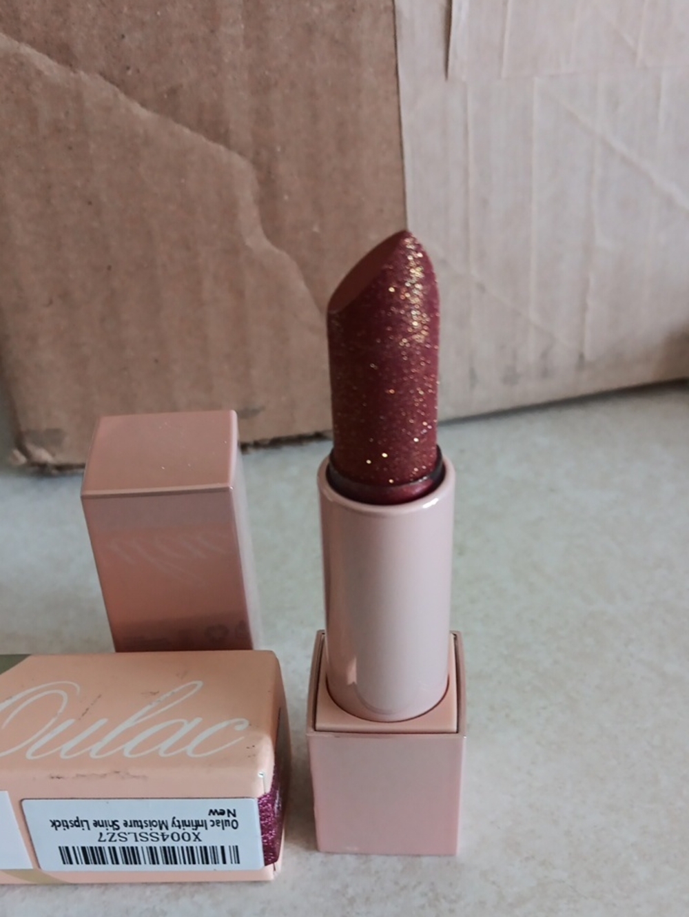Oulac Infinity Moisture Shine Lipstick with Shimmer. Color Wildfire D05.